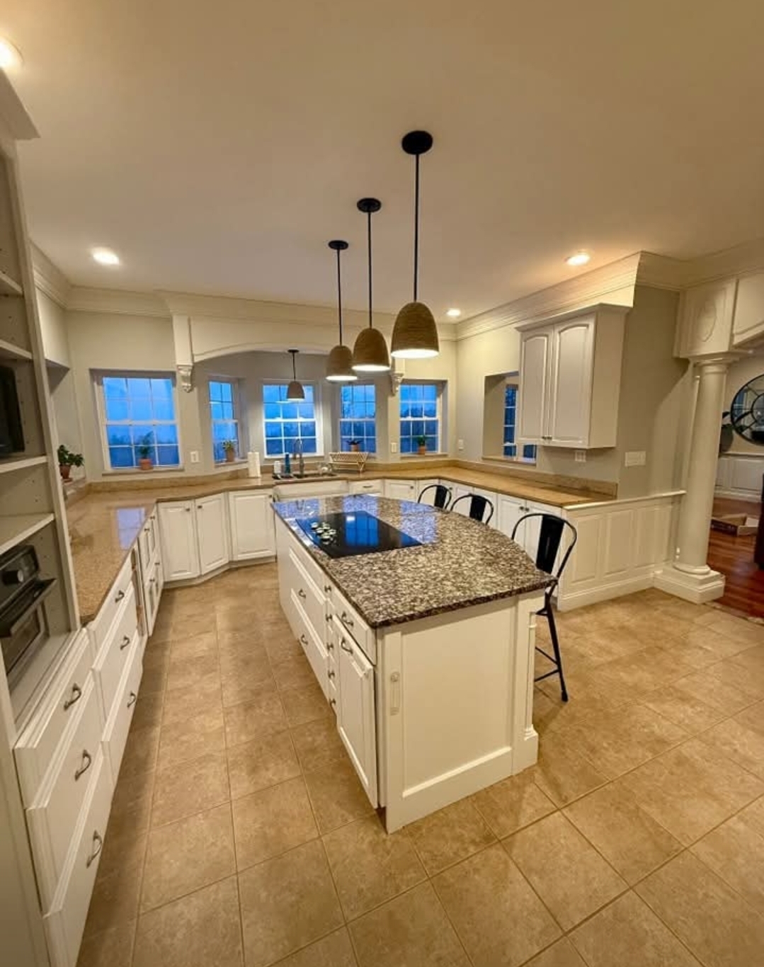 Repainted kitchen with white cabinetry and trim in Mason, New Hampshire